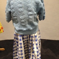 Little Girl - Blue & white checked cotton with anchors & wheel, blue open knit short sleeve cardigan & white cotton blouse '42'