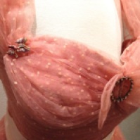 Mattie - Close-up of accessories on pink tulle dress