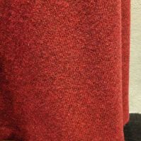 Mattie - Close-up of red wool A-line skirt fabric
