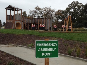 Emergency Assembly Point in front of the toy soldiers at the kids play area - somewhat ironic?