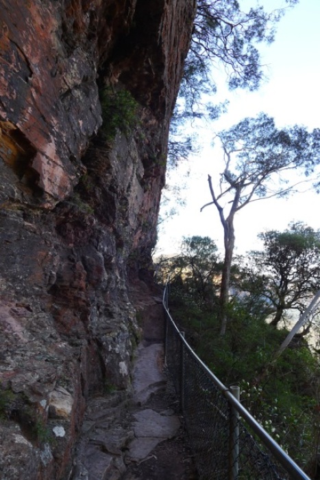 Narrow, but still plenty of room to walk single-file past the cliff face